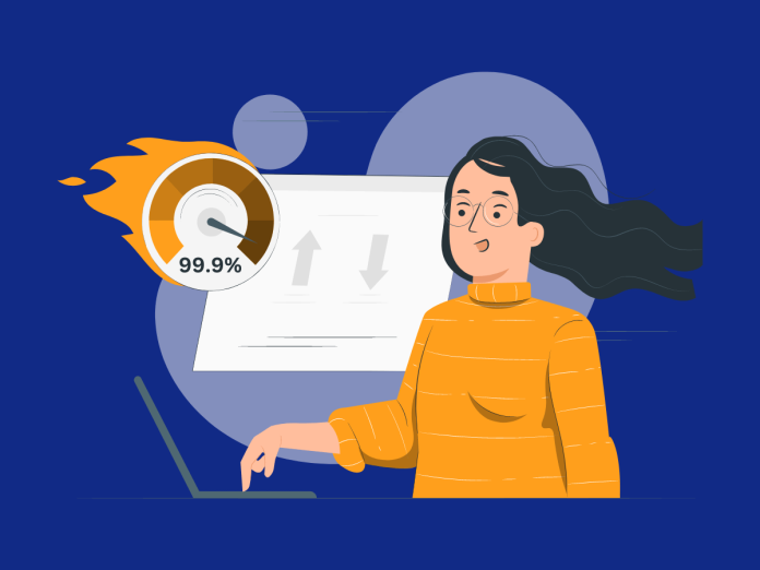 Image of woman on laptop looking at web hosting uptime